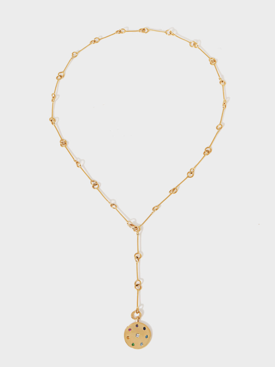 A long gold 26 inch lariat link chain with a gold multi gemstone pendant with 8 different coloured stones set in a circle and one centrally