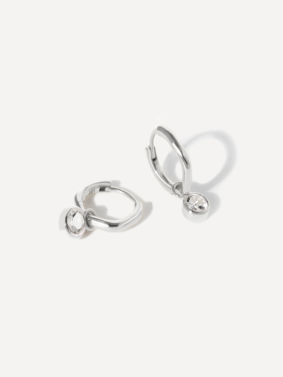 Sterling Silver Birthstone Huggies April - White Topaz