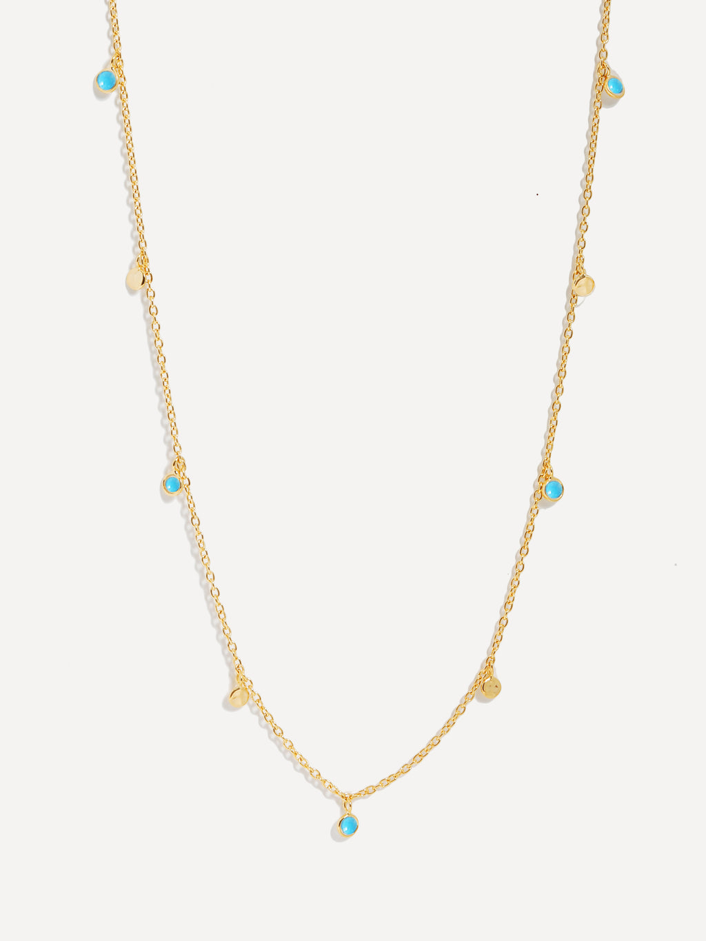 Collier en or avec des paillettes turquoise