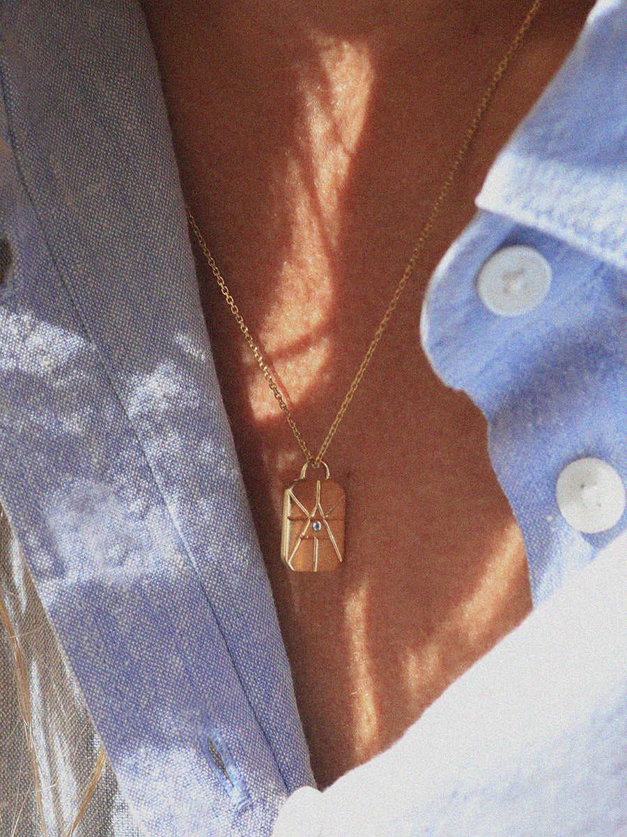 Gold Elements Air Sign Necklace with Blue Topaz