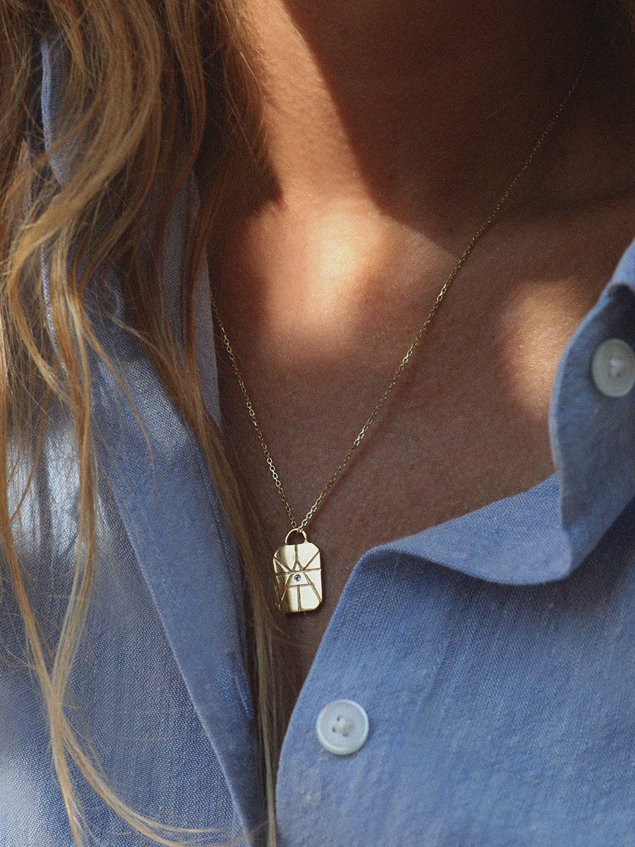 Gold Elements Air Sign Necklace with Blue Topaz