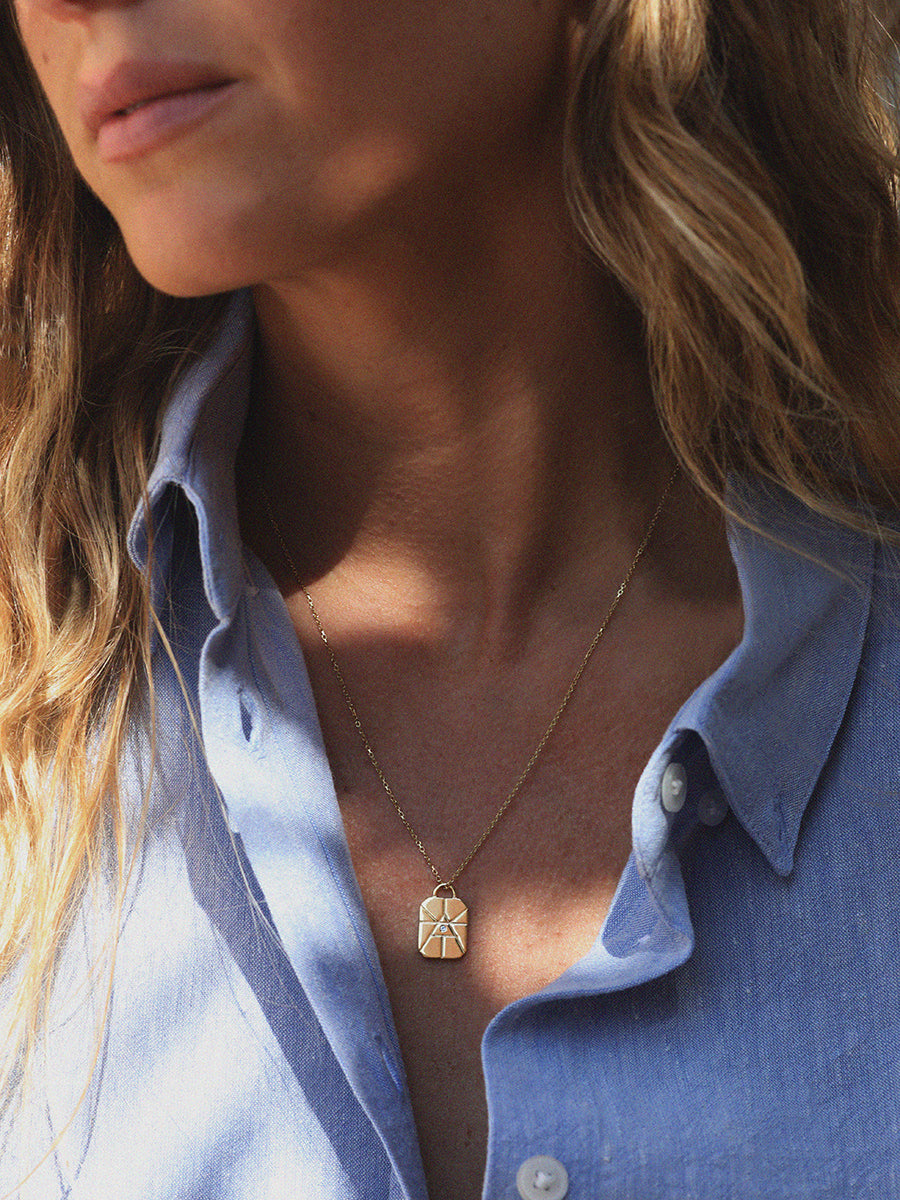Gold Elements Air Sign Necklace with Blue Topaz