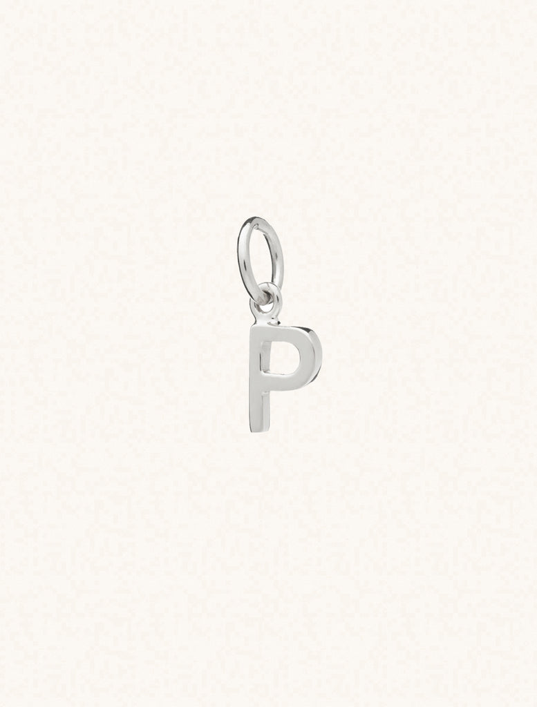 A sterling silver caplital letter P approximately 8mm x 6mm with a connecting ring to thread through a necklace at the top. Set on a cream background.