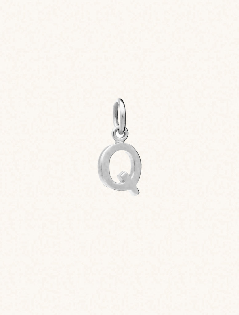 A sterling silver caplital letter Q approximately 8mm x 6mm with a connecting ring to thread through a necklace at the top. Set on a cream background.